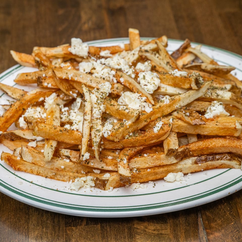 Hand-cut Greek fries with feta.